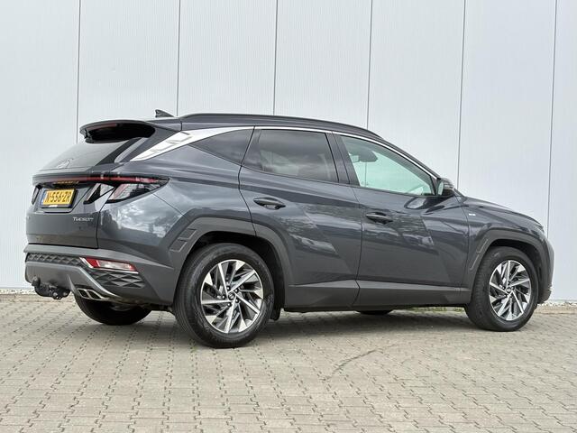 Hyundai TUCSON 1.6 T-GDI MHEV Comfort Smart / Android Auto/Apple Carplay / Lederen Bekleding / Navigatie / Climate Control / Camera / Cruise Control / Draadloze Telefoonlader / Elektrische Stoel / Stoelverwarming / Lane Assist / Krell Audio / DAB /