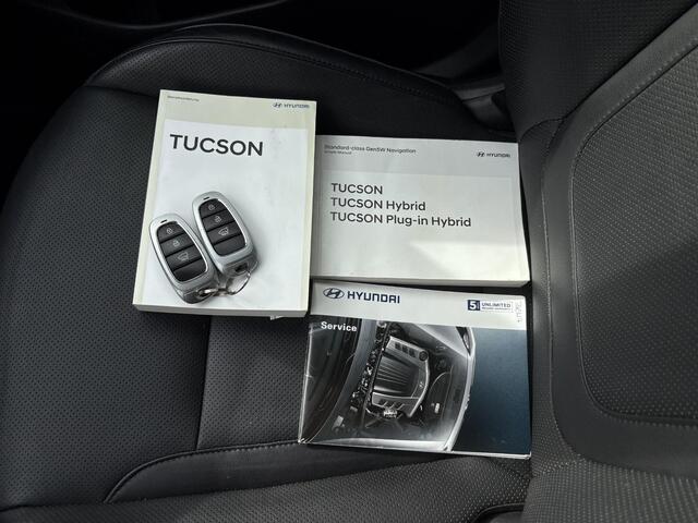 Hyundai TUCSON 1.6 T-GDI MHEV Comfort Smart / Android Auto/Apple Carplay / Lederen Bekleding / Navigatie / Climate Control / Camera / Cruise Control / Draadloze Telefoonlader / Elektrische Stoel / Stoelverwarming / Lane Assist / Krell Audio / DAB /