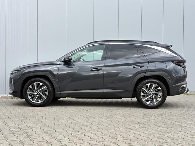 Hyundai TUCSON 1.6 T-GDI MHEV Comfort Smart / Android Auto/Apple Carplay / Lederen Bekleding / Navigatie / Climate Control / Camera / Cruise Control / Draadloze Telefoonlader / Elektrische Stoel / Stoelverwarming / Lane Assist / Krell Audio / DAB /