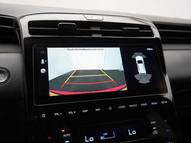 Hyundai TUCSON 1.6 T-GDI N Line 4WD PHEV 265pk Dealer O.H. | Adaptive Cruise | Camera | Alcantara Sportstoelen & Stuur Verwarmd | Krell Audio | Apple Carplay | Keyless | Blis | 19"L.M | Navigatie | DAB | Plug In Hybrid |