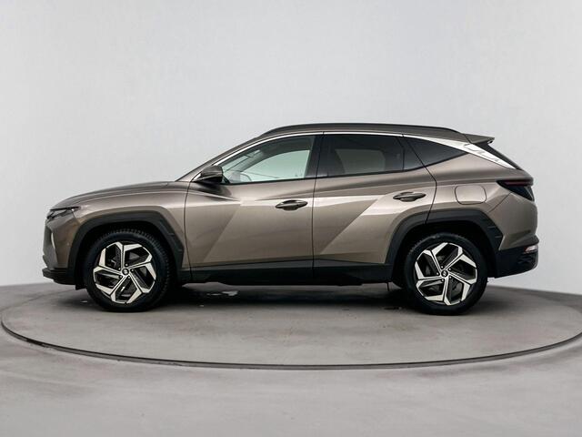 Hyundai TUCSON 1.6 T-GDI HEV Premium | Stoel verwarming & verkoeling | Navigatie | Achteruitrij camera | Apple Carplay/Android Auto | Dodehoek detectie |