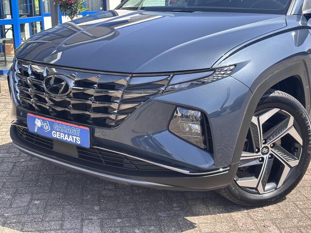 Hyundai TUCSON 1.6 T-GDI PHEV Premium 4WD l Panoramadak, Stoelverwarming, Adaptieve Cruise control, Camera, Elektr. kofferklep, Keyless, Apple Carplay/Android Auto.