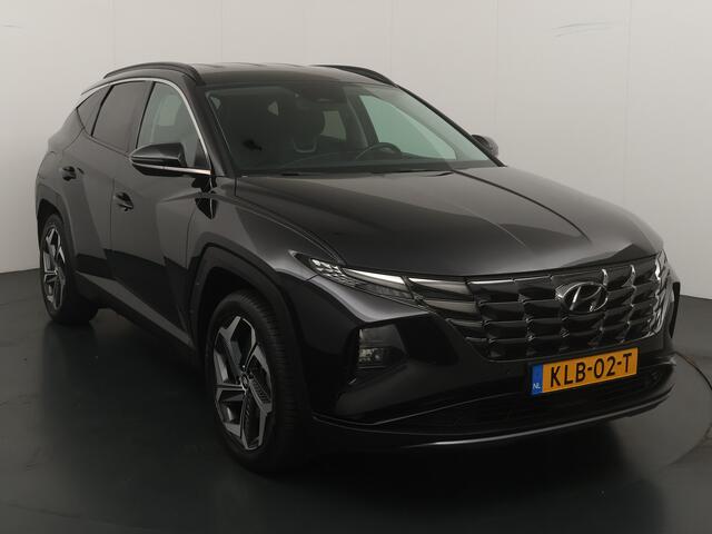 Hyundai TUCSON 1.6 T-GDI PHEV 265pk Comfort 4WD | Trekhaak | Stoelverwarming | Adapt. cruise | Elektrisch verstelbare stoel | Camera | Krell audio |