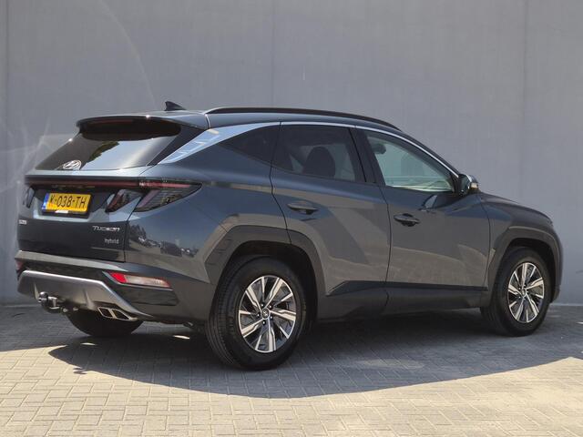Hyundai TUCSON 1.6 T-GDI HEV Comfort Smart / trekhaak vast / Trekgewicht 1650 kg / Elektrische achterklep / Stuur- & Stoelverwarming / Achteruitrijcamera / Adaptief cruise control / Draadloze telefoon lader / Keyless Entry/Start / Apple Carplay Android Auto /