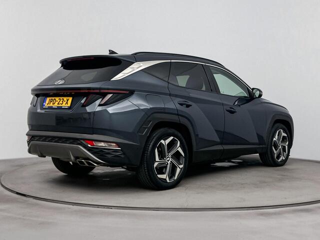 Hyundai TUCSON 1.6 T-GDI PHEV Premium Sky 4WD | Schuif kanteldak | Stoelverwarming & verkoeling | Stuurverwarming | Achteruitrij camera | Navigatie | Dodehoek detectie |