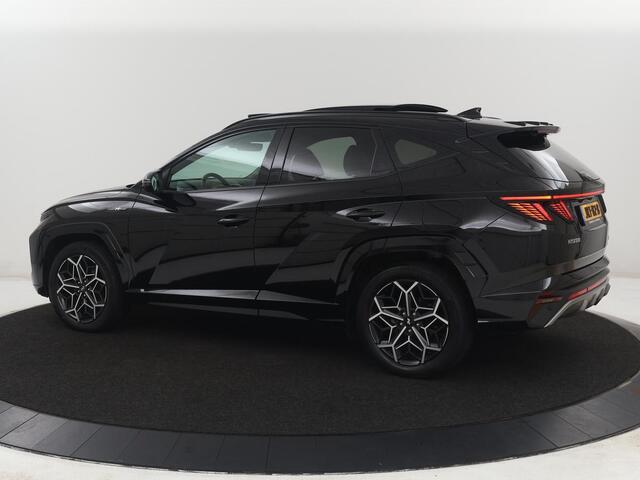 Hyundai TUCSON 1.6 T-GDI PHEV N Line Sky 4WD | Panoramadak | Stoelverwarming | Leder/Alcantara | Camera | Adaptive cruise | Carplay | Full LED | Stuurverwarming | Keyless | Plug In