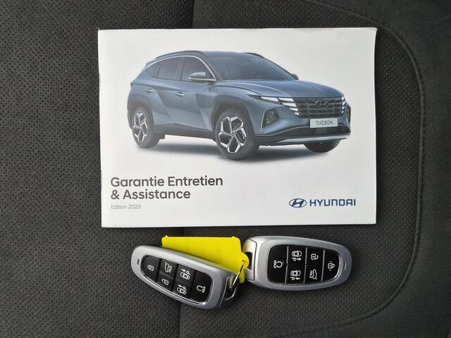 Hyundai TUCSON 1.6 T-GDI HEV N Line / Trekgewicht 1650 kg / Elektrische achterklep / Glazen schuif- en kanteldak / Stuur- Stoel & Achterbank verwarming / Rondomzicht camera / Adaptief cruise control / Keyless Entry/Start / Apple Carplay Android Auto /