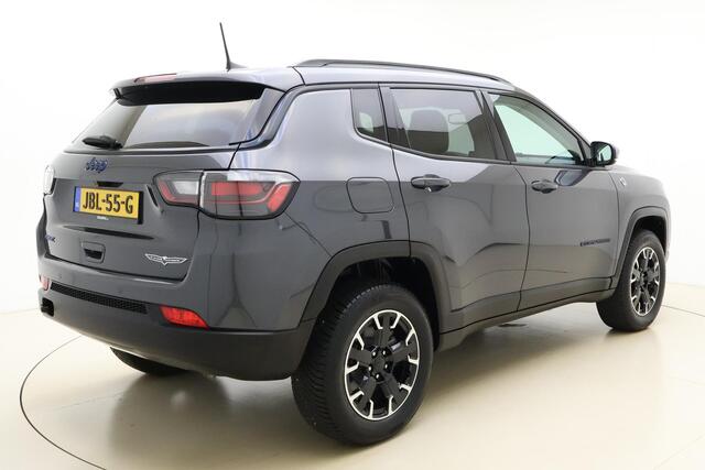 Jeep COMPASS 4xe 240 Plug-in Hybrid Electric Trailhawk | Navigatie | Lichtmetalen velgen | Keyless | Camera | Dakrails | Half lederen bekleding | Rxtra getint glas | Draadloze telefoonlader