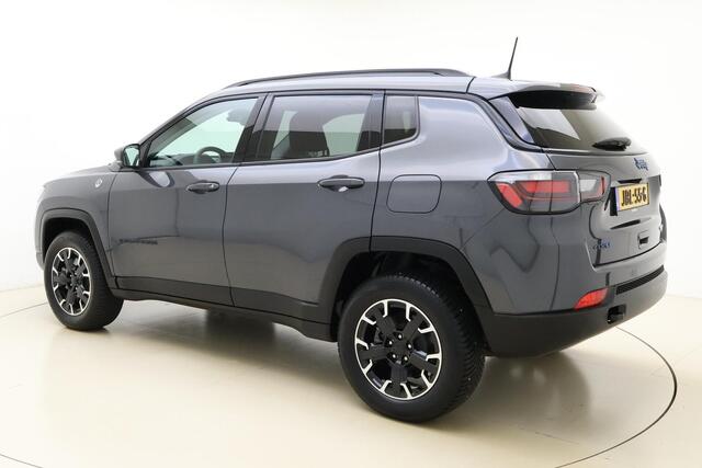 Jeep COMPASS 4xe 240 Plug-in Hybrid Electric Trailhawk | Navigatie | Lichtmetalen velgen | Keyless | Camera | Dakrails | Half lederen bekleding | Rxtra getint glas | Draadloze telefoonlader