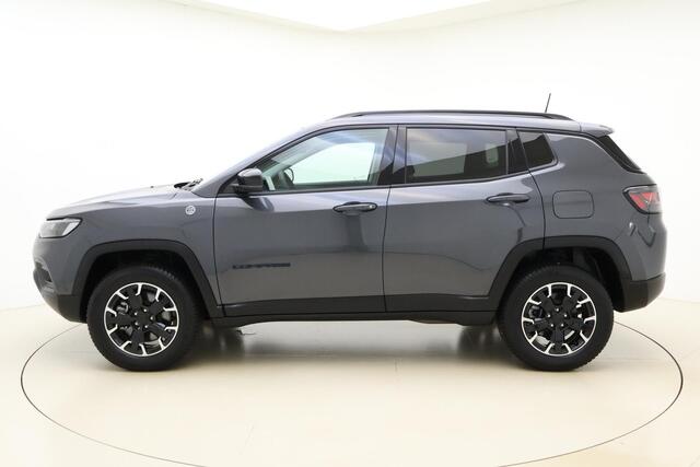 Jeep COMPASS 4xe 240 Plug-in Hybrid Electric Trailhawk | Navigatie | Lichtmetalen velgen | Keyless | Camera | Dakrails | Half lederen bekleding | Rxtra getint glas | Draadloze telefoonlader