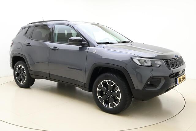 Jeep COMPASS 4xe 240 Plug-in Hybrid Electric Trailhawk | Navigatie | Lichtmetalen velgen | Keyless | Camera | Dakrails | Half lederen bekleding | Rxtra getint glas | Draadloze telefoonlader