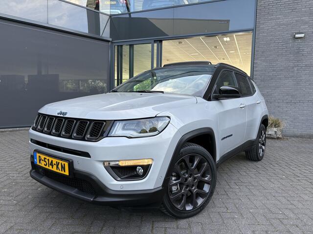 Jeep COMPASS 4xe 240 Plug-in Hybrid Electric Trailhawk Airco - Schuif/kanteldak - Achteruitrijcamera - Apple carplay - Parkeersensoren - Navigatie - Oplaadmogelijkheid - Lederen bekleding - Cruise control - Dakrails - Led verlichting - Elektrische ramen - Bluetooth -