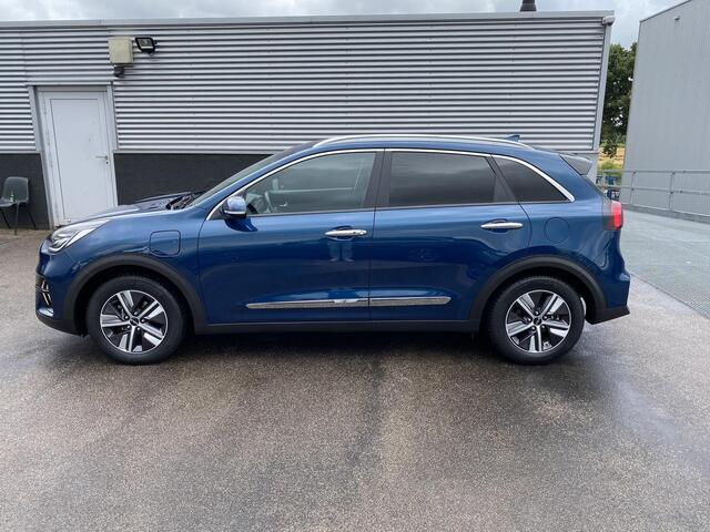 KIA Niro 1.6 GDi PHEV DynamicPlusLine Trekhaak, Dodehoek detectie, Lederen bekleding, 1e eign. Dealeronderhouden, All-season banden, Parkeersensoren v&a, Stoel- & stuurverwarming, achteruitrij camera, adaptieve cruise control, keyless,