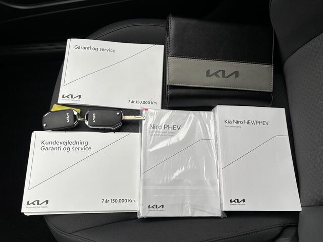 KIA Niro 1.6 GDi PHEV DynamicLine Automaat / Fabrieksgarantie tot 5-2028 / Dealer onderhouden / 1.300kg trekgewicht / All season banden / Stuur & Stoelverwarming / Apple Carplay Android Auto / Camera /