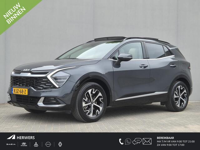 KIA SPORTAGE 1.6 T-GDi Hybrid DynamicPlusLine / Dealer onderhouden / Trekgewicht 1650 kg / Elektrische achterklep / Harman/Kardon Audio Systeem / Glazen schuif- en kanteldak / Rondomzicht camera / Stuur- Stoel & Achterbank verwarming / Adaptief cruise control / Stoelv