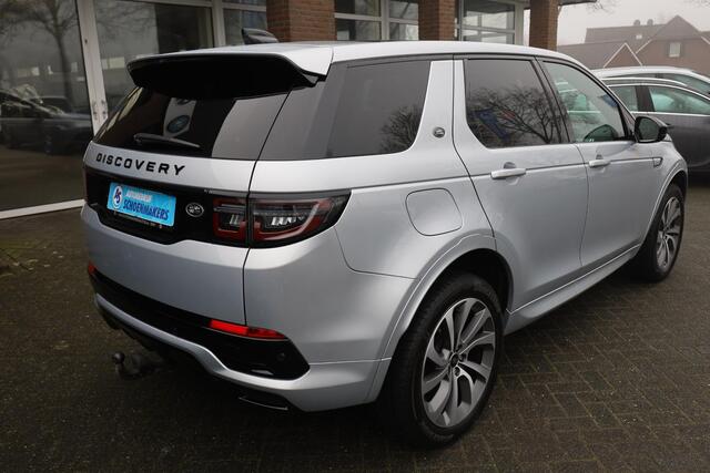 Land Rover DISCOVERY SPORT P300e 1.5 R-Dynamic PANO WINDSOR-LEER MEMORY ELEK.TREKHAAK 20"LMV CAMERA RUITVERWARMING MERIDIAN GSM-LADER ELEK.LAADKLEP 4x4 STOELVERW. ZWARTE-HEMEL NAVI