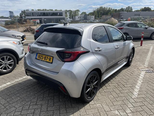 Mazda 2 Hybrid 1.5 Homura , Demovoordeel ¤ 3.000,-, Automaat, Apple Carplay, Clima, Adap.Cruise, LMV 17 Inch, Camera, PDC, Stuur/Stoelverwarming