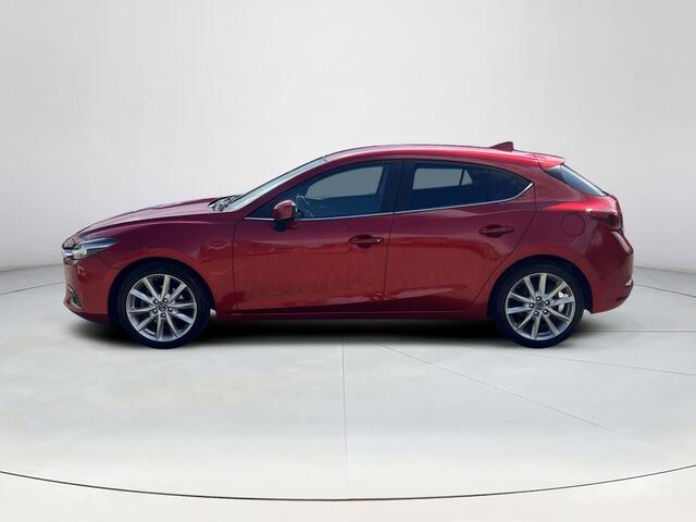 Mazda 3 2.0 SkyActiv-G 120 GT-M | Cruise Control | Navigatie | Bose Premium Audio | Lederen Bekleding | Stoel/Stuur Verwarming | Trekhaak Afneembaar | Head-Up Display | Lichtmetalen velgen |