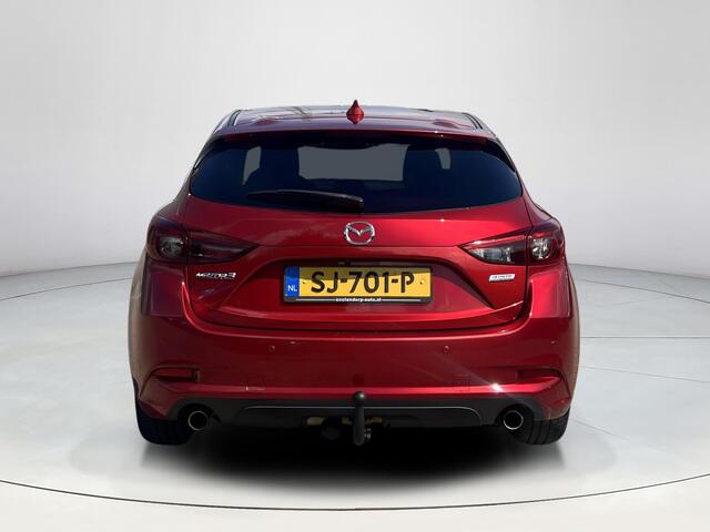 Mazda 3 2.0 SkyActiv-G 120 GT-M | Cruise Control | Navigatie | Bose Premium Audio | Lederen Bekleding | Stoel/Stuur Verwarming | Trekhaak Afneembaar | Head-Up Display | Lichtmetalen velgen |