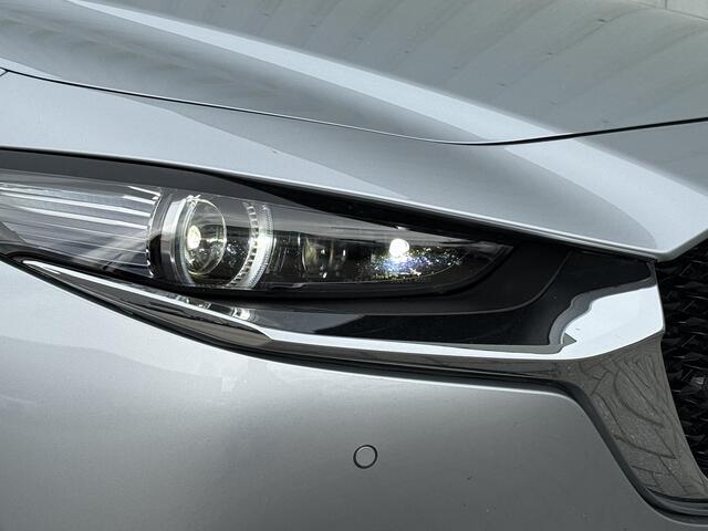 Mazda CX-30 2.0 e-SkyActiv-G M Hybrid Comfort / Trekhaak / BOSE / 360 Camera /Adaptieve Cruise Control / Head-up display / Navigatie / Stoel & Stuurverwarming / Lederen bekleding / Apple Carplay & Android Auto / Dodehoek detectie /