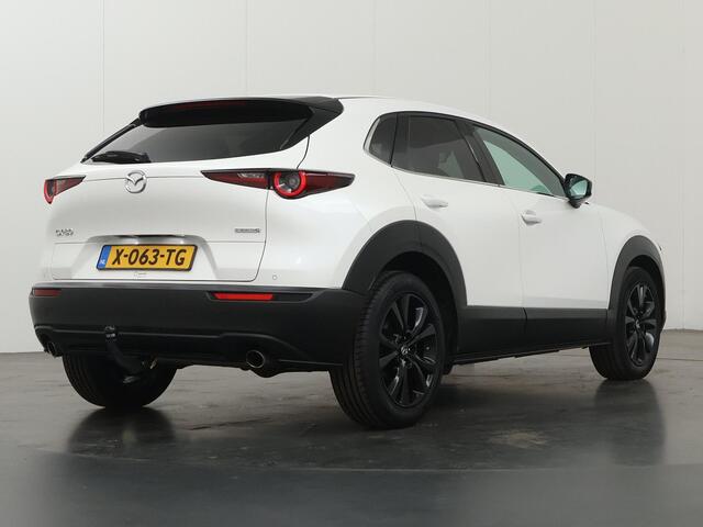 Mazda CX-30 2.0 e-SkyActiv-G M Hybrid Sportive | Trekhaak | Dodehoekdetectie | HUD | Apple Carplay/Android Auto | Elektrisch bedienbare achterklep | Stoelverwarming | Lane Assist |