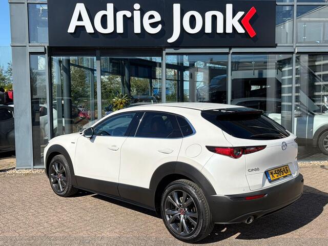 Mazda CX-30 2.0 e-SkyActiv-X M Hybrid100th Anniversary Ed. | TREKHAAK | APPLE-CARPLAY | LEDER | 18 INCH | 360 CAMERA | DODEHOEK DETECTIE | SCHUIF/KANTELDAK | ADAPTIEF CRUISE CONTROL |