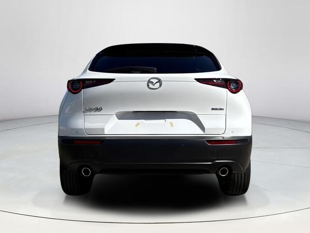 Mazda CX-30 2.5 e-SkyActiv-G M Hybrid Homura | Dodehoeksensoren | Draadloze Applecarplay en Android Auto | Adaptieve Cruise Control | Automaat | 18inch zwarte velgen | Achteruitrijcamera | Elektrische achterklep |