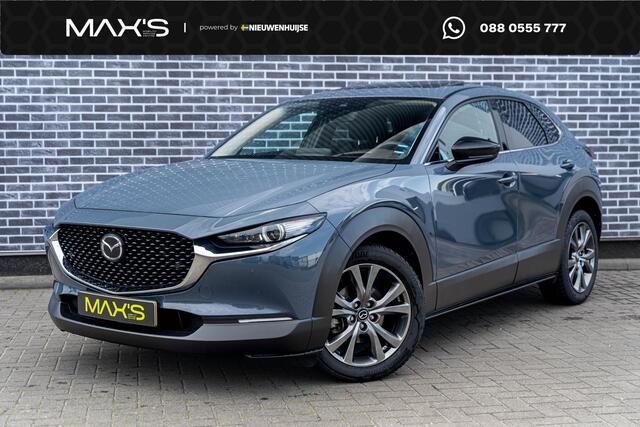 Mazda CX-30 2.0 e-SkyActiv-X M Hybrid Luxury | Trekhaak | Schuifdak | Lederen Bekleding | Bose Audio | Head-up Display | Lichtmetalen Velgen | Elektrische Achterklep | Keyless Entry | Navigatie | Apple Carplay Android Auto | Achteruitrijcamera | Parkeersensoren