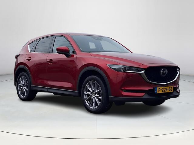 Mazda CX-5 2.5 4WD SkyActiv-G 194 Luxury | Dealeronderhouden | Trekhaak | Apple Carplay/Android Auto | Stoelverwarming/verkoeling | Elektrische verstelbare stoelen met geheugen | Bose Premium soundsysteem | Elektrische achterklep | 360 graden camera | Climate contro