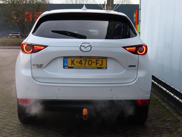 Mazda CX-5 2.0 SkyActiv-G 160 GT-M 4WD 4 seizoenen banden l Trekhaak l Achteruitrij camera l Head-up display l Stoel- en stuurverwarming l Start-stop knop l Automaat