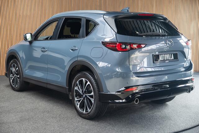 Mazda CX-5 2.0 e-SkyActiv-G M Hybrid 165 HUD Navi 360 ° PDC Stuur- & stoelverwarming Elektr. bedienbare achterklep Climate C. Cruise C. LM velgen Splinternieuw!