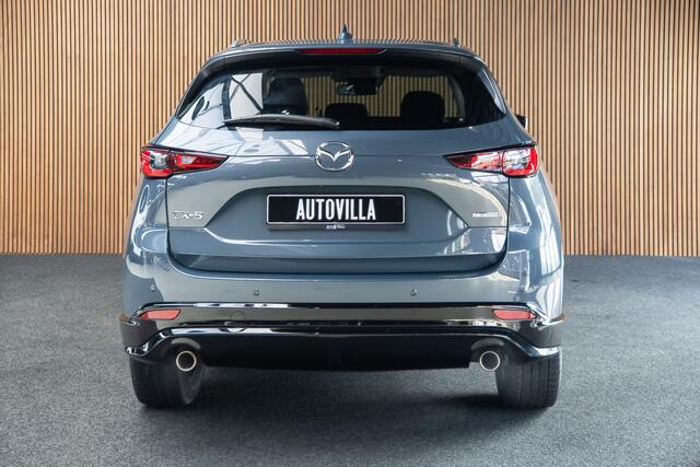 Mazda CX-5 2.0 e-SkyActiv-G M Hybrid 165 HUD Navi 360 ° PDC Stuur- & stoelverwarming Elektr. bedienbare achterklep Climate C. Cruise C. LM velgen Splinternieuw!