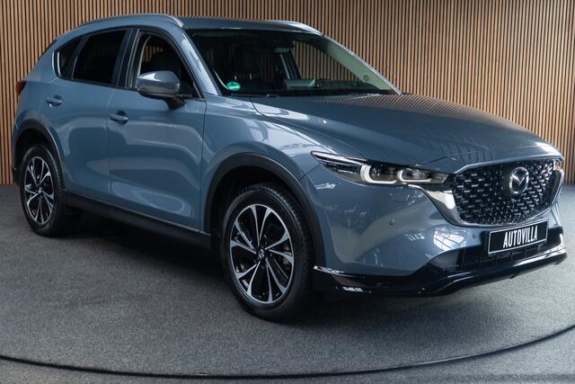 Mazda CX-5 2.0 e-SkyActiv-G M Hybrid 165 HUD Navi 360 ° PDC Stuur- & stoelverwarming Elektr. bedienbare achterklep Climate C. Cruise C. LM velgen Splinternieuw!
