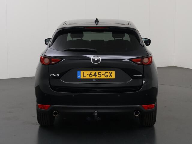 Mazda CX-5 2.0 SkyActiv-G 165 Luxury | Trekhaak | Lederen Bekleding | Ele.verstelbare stoelen | 360 Camera | Stoel/Stuurverwarming | Stoelkoeling | Adaptieve Cruise Control | HUD | Bose Audio | Ele. kofferdeksel |