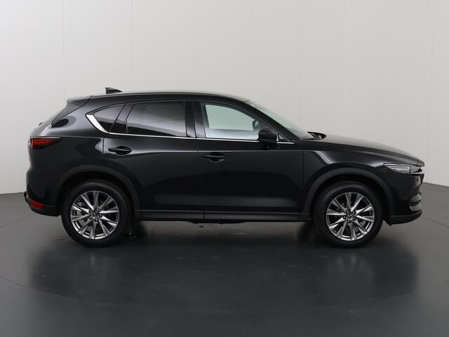 Mazda CX-5 2.0 SkyActiv-G 165 Luxury | Trekhaak | Lederen Bekleding | Ele.verstelbare stoelen | 360 Camera | Stoel/Stuurverwarming | Stoelkoeling | Adaptieve Cruise Control | HUD | Bose Audio | Ele. kofferdeksel |