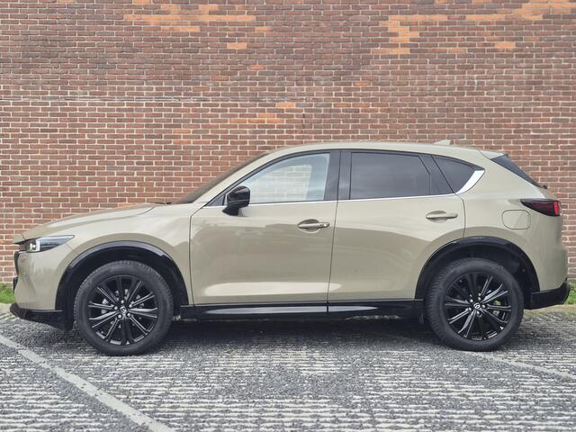 Mazda CX-5 2.0 e-SkyActiv-G M Hybrid 165 Homura NAVI | ACHTERUITRIJCAMERA | 19 INCH LMV | PARKEERSENSOREN TREKHAAK | HEAD-UP DISPLAY | ELEKTRISCHE ACHTERKLEP