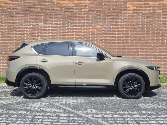 Mazda CX-5 2.0 e-SkyActiv-G M Hybrid 165 Homura NAVI | ACHTERUITRIJCAMERA | 19 INCH LMV | PARKEERSENSOREN TREKHAAK | HEAD-UP DISPLAY | ELEKTRISCHE ACHTERKLEP