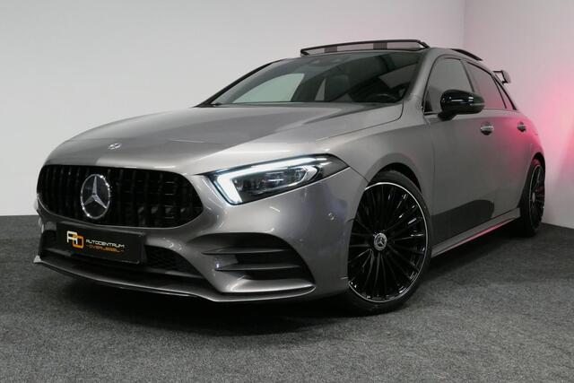Mercedes-Benz A-KLASSE 200 AMG Line / A45 AMG Diffuser / Panamericana Grille / Panoramadak / A45 Dakspoiler / Elektr. verstelbare voorstoelen + memory / Multibeam LED Koplampen / Apple Carplay - Android Auto / Stoelverwarming / Ambienteverlichting / 19'' LMV / Night pakket / Do