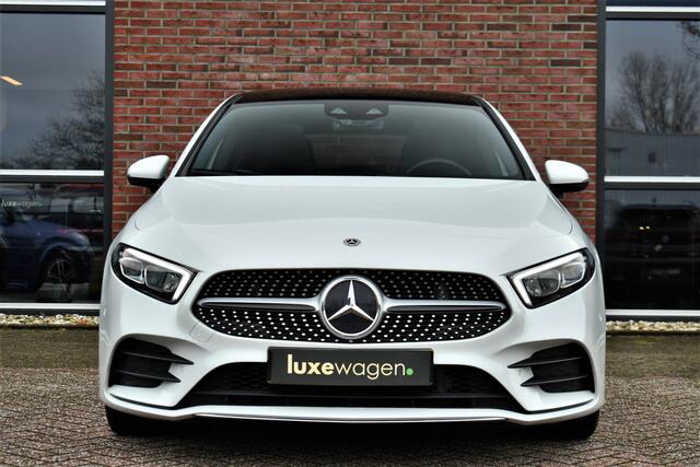 Mercedes-Benz A-KLASSE 180 AMG Pano Trekhaak Camera Night Metallic-wit
