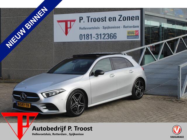 Mercedes-Benz A-KLASSE 180 AMG Night pakket Panoramadak/Stoelverwarming/Sfeerverlichting/DAB/Achteruitrijcamera/Cruise control 2e Paasdag geopend op Hellevoetsluis & Rotterdam van 12:00 tot 17:00