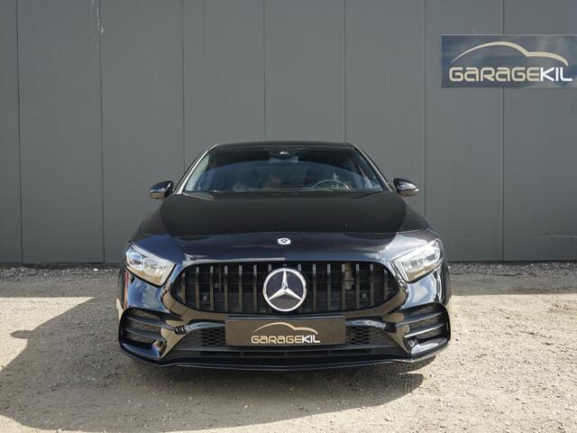 Mercedes-Benz A-KLASSE 180 Business Solution AMG Night pakket / Camera / AMG / LED / Panamericana Grille / 19'' LM velgen / Privacy glass / Stoel verw.
