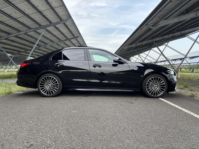 Mercedes-Benz C-KLASSE 300 e Business Solution AMG | Night | Panoramadak | Digital light | Memory stoelen | 19" Multispaaks velgen | Sfeerverlichting |