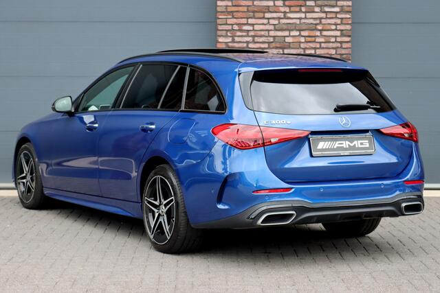 Mercedes-Benz C-KLASSE Estate 300 e AMG Line | Distronic Pro | Panoramadak | Burmester | Memory | HUD | Surround Camera | Trekhaak | Digital Light | Keyless Go | Night Pakket |