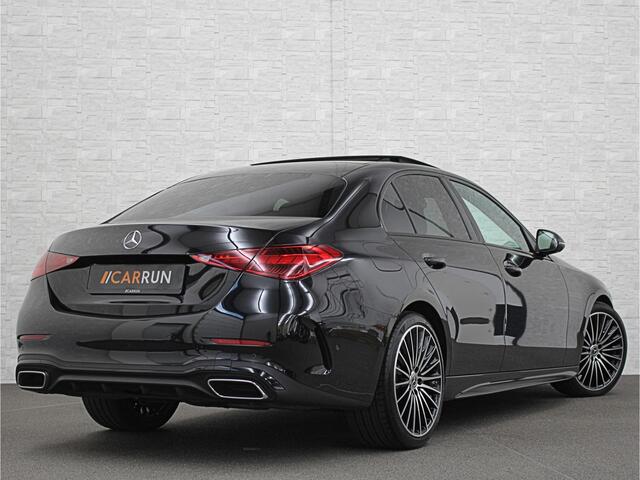 Mercedes-Benz C-KLASSE 300 Benzine 4MATIC AMG-Line | 360 Camera | Panorama | ACC | 19'' | Digital-LED | Night-Pakket | Nw.pr; 100758,= | Memory | Trekhaak | Sfeerverlichting | Rij-Assistent Plus | Parfumering | Autom. Parkeren | Carplay | Draadloos Laden.