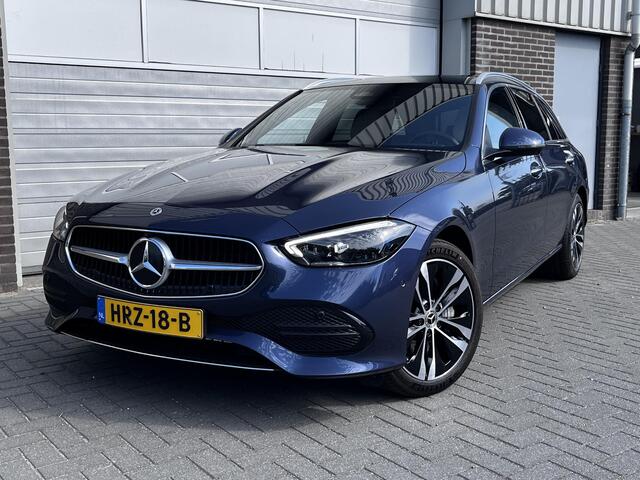 Mercedes-Benz C-KLASSE Estate 300 e Luxury Line | Leder Beige | Panoramadak | Winter Pakket | Trekhaak | DIGITAL LIGHT | DISTRONIC Afstandsassistent | 360° Camera | Stuurverwarming | Apple CarPlay | Android Auto | Elektrisch Verstelbare Stoelen + Memory