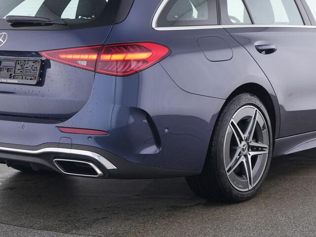 Mercedes-Benz C-KLASSE Estate 300 e AMG Plug-In Hybride AMG Line | Trekhaak | Panorama Schuif-Kanrteldak | Distronic | Stuur en Stoelverwarming. Inclusief 24 maanden Mercedes-Benz Certified garantie voor Europa.