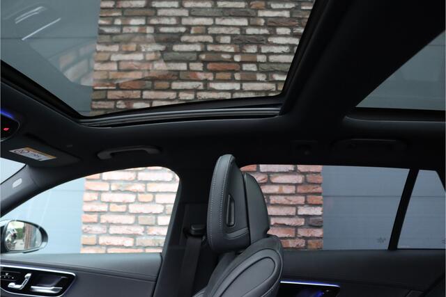 Mercedes-Benz C-KLASSE Estate 300 e AMG Line | Panoramadak | Distronic | Trekhaak | Memory | Sfeerverlichting Premium | Stoelverwarming | Nightpakket | Camera | Dodehoekassistent |