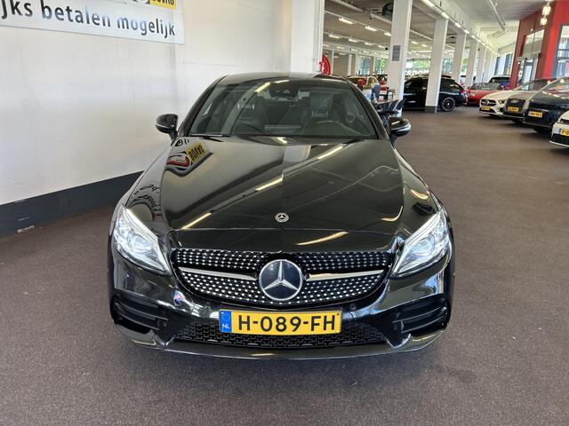 Mercedes-Benz C-KLASSE Coupé 300 Premium Plus Pack AMG 260PK Facelift | Dealer onderhouden | Cruise control | Climate control | Sfeerverlichting | Achteruitrijcamera | Adaptief onderstel | Stoelverwarming | Lane assist | Dodehoeksdetectie