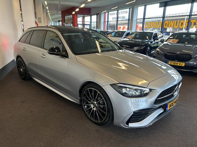 Mercedes-Benz C-KLASSE Estate 180 AMG Line | Panoramadak | Sfeerverlichting | Achteruitrijcamera | Cruise control | Adaptief onderstel | Lane assist | Dodehoeksdetectie | Stoelverwarming | Apple carplay