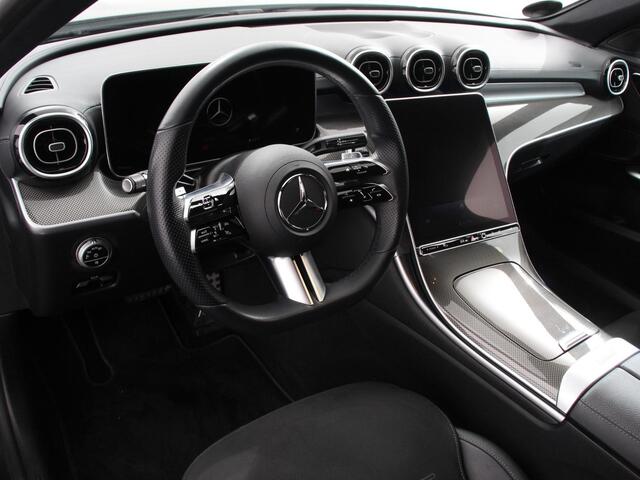 Mercedes-Benz C-KLASSE Estate 200 AMG Line | Climate control | Achteruitrijcamera | Wegklapbare trekhaak | Navigatie | Dodehoek assistent | LED | Sfeerverlichting | Adaptieve cruise control | Verwarmde voorstoelen | Elektrische kofferbak